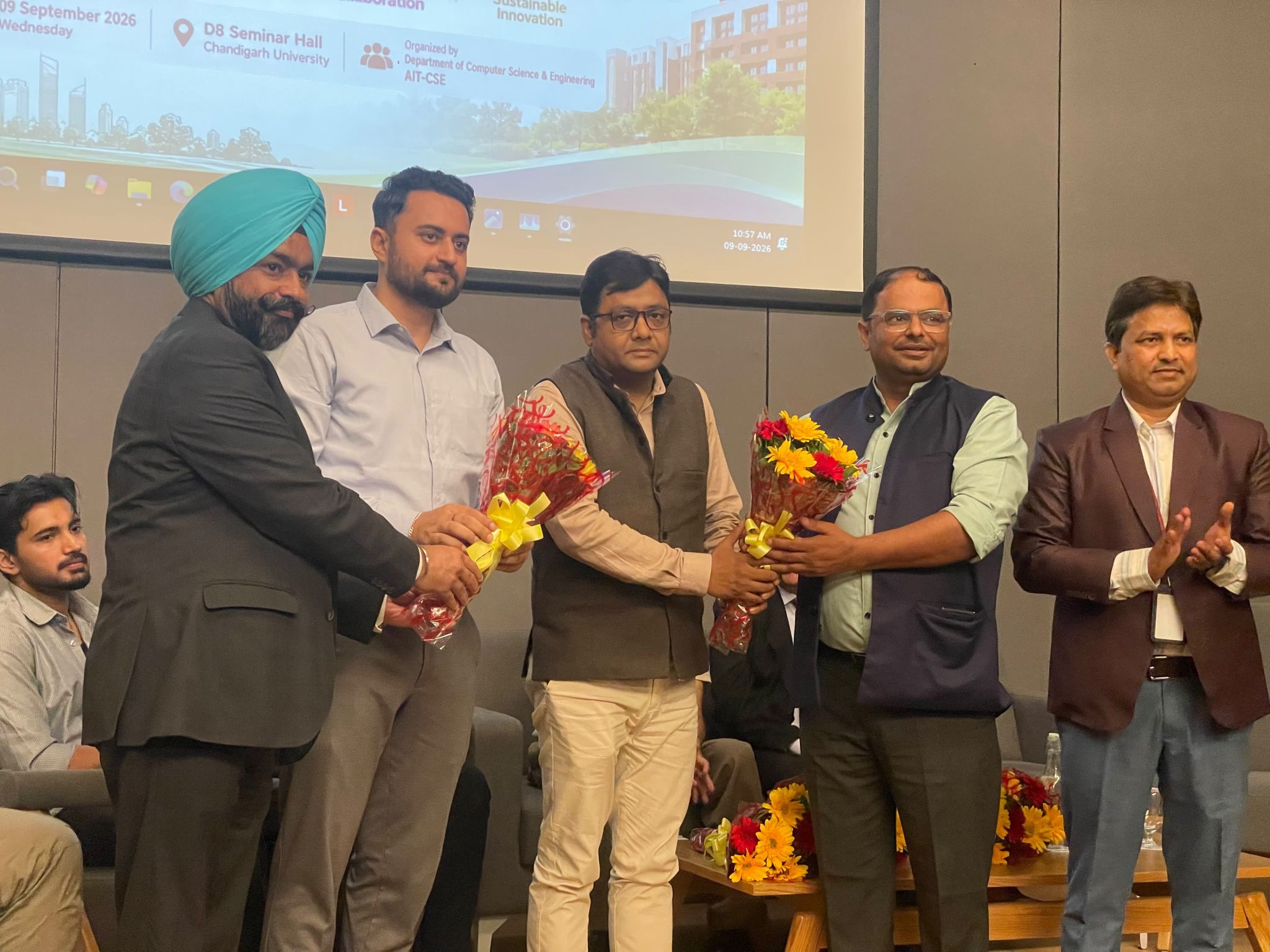Industry experts participate in a panel discussion on AI in academia and industry at Chandigarh University.